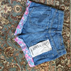$192 LF distressed floral cuffed denim shorts